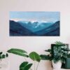 Blue Mountain range of the lions from vancouver bc canada against a lavendar purple and pink sunset sky highly textured acrylic art print on white wall above potted plant in white basket and white chair with a white table and potted plants on it