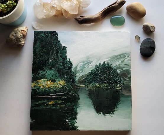 Misty tree painting with dark green trees on a grey lake painting