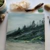 Misty Beach painting with dark green foliage and trees shrouded in mist along a dark sandy beach